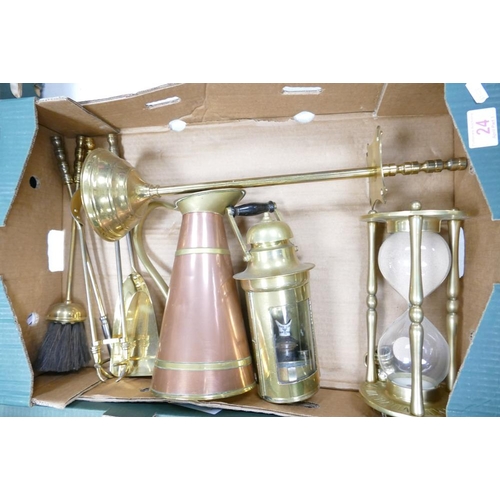 24 - A collection of brass ware to include fireside set, sandglass timer, gas lamp etc