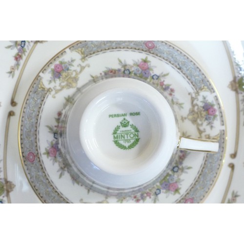 124 - A collection of Minton Persian Rose tea and dinnerware, including tea set, large platters, tureen & ... 