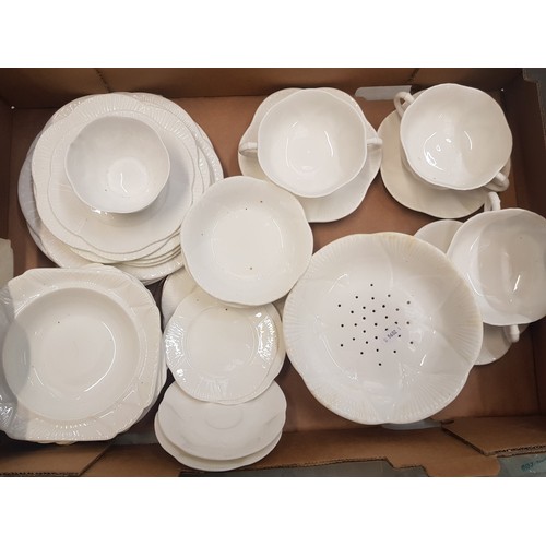 38 - A collection of Shelley bone china items to include twin handled soup coups and saucers, side plates... 