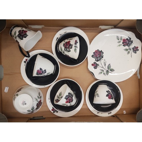 41 - Royal Albert Masquerade pattern part tea set consisting of a cake plate, milk, sugar, 4 trios and a ... 