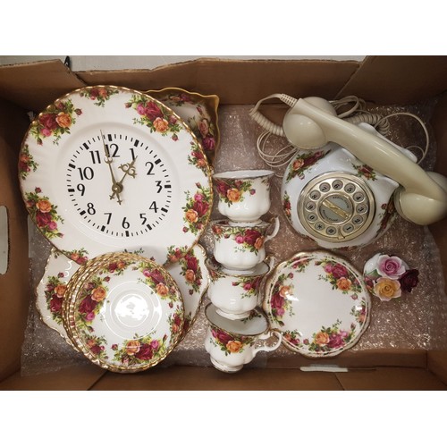 42 - Royal Albert Old Country Roses pattern items to include a wall clock, dial-up telephone, cups and sa... 