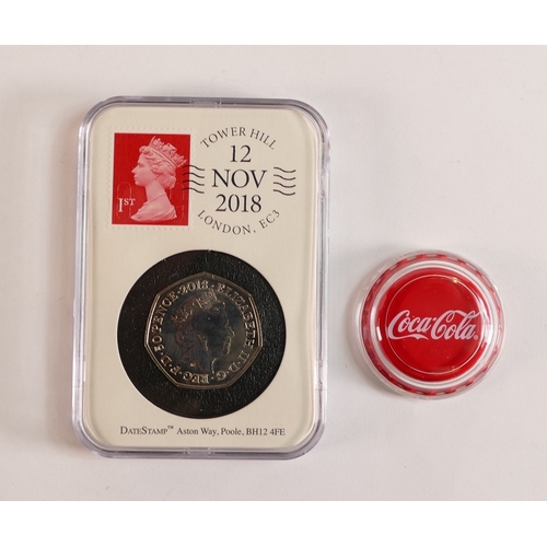 747 - UK 2018 50p date stamp proof coin and a Coca Cola silver coin, boxed. (2)