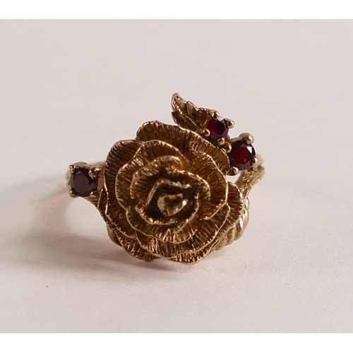 754 - 9ct gold ladies Rose ring set with red stones, size M/N, 5.5g.