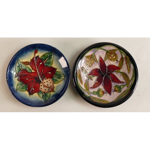 127 - Two Moorcroft pin dishes to include Simeon and Delonix . Boxed