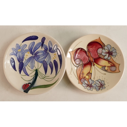 129 - Two Moorcroft pin dishes to include Fly away home and Butterfly. Boxed