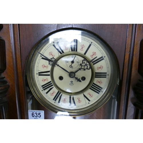 635 - A 19th Century Vienna Clock with Enamel Face marked with mark for the clockmaker Geo Kuehl. Some wea... 