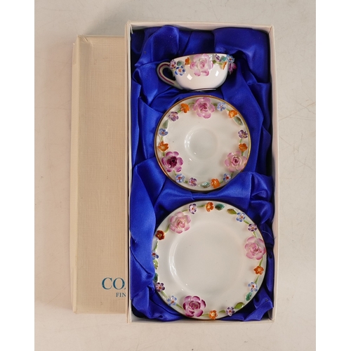 294 - A Boxed Coalport Florally Encrusted Miniature Trio to include Cup, Saucer and Plate. Diameter of pla... 