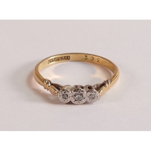 803 - 18ct gold three stone diamond ring, size M, 2g.