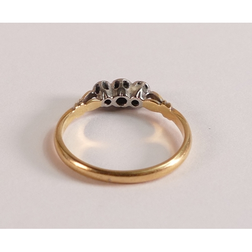 803 - 18ct gold three stone diamond ring, size M, 2g.