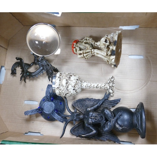 68 - A mixed collection of items to include mystical Witches Ball, resin skull theme goblet & candlestick... 