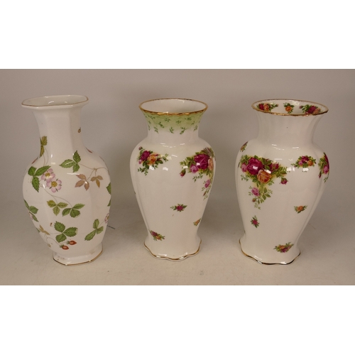 299 - Two Royal Albert Old Country Roses vases together with one Wedgwood Wild Strawberry, height of talle... 