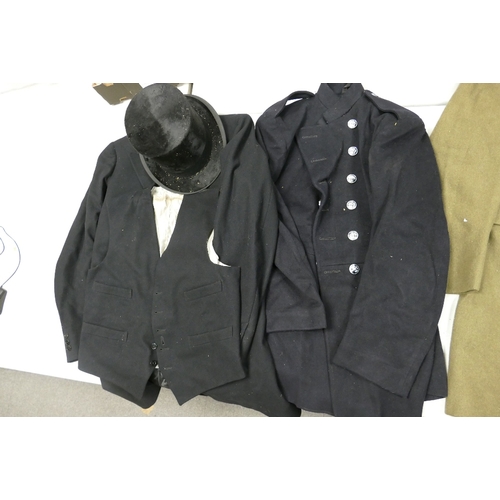 673 - A collection of clothing items to include Lincoln Bennett & co top hat and tails jacket with waistco... 