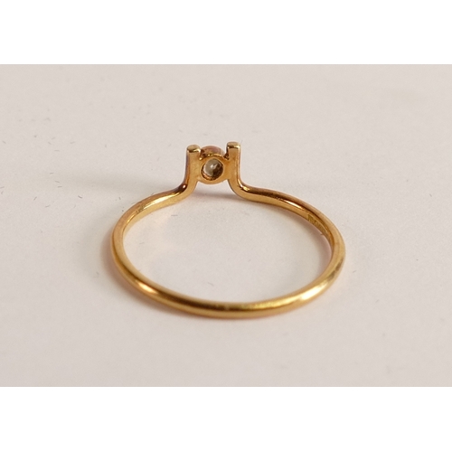 703 - 18ct gold diamond ring, size K, 1g.