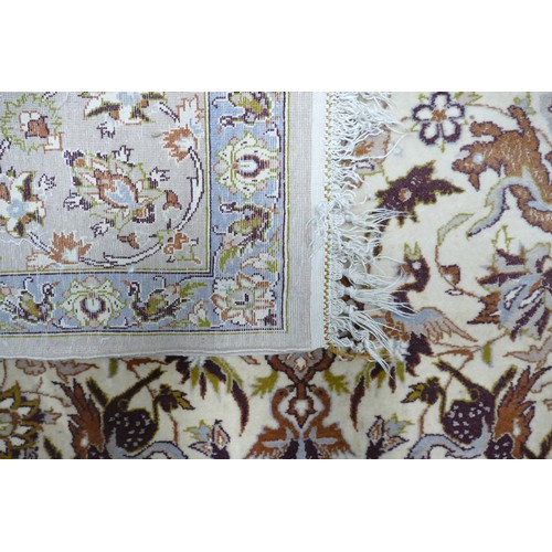 311N - A Persian Style Floor Rug with Animal Patterns. Length: 170cm Width: 110cm