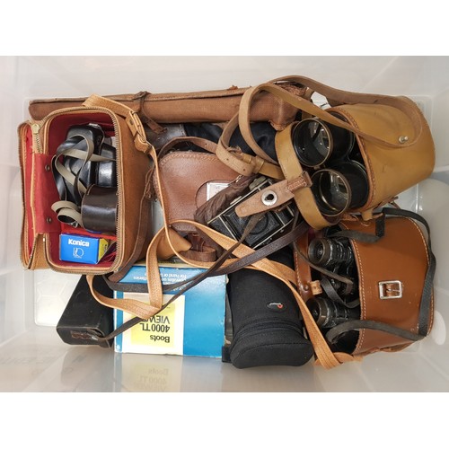 63 - Mixed optics to include 2 cased pairs of binoculars/field glasses, vintage cameras, cased vintage ca... 