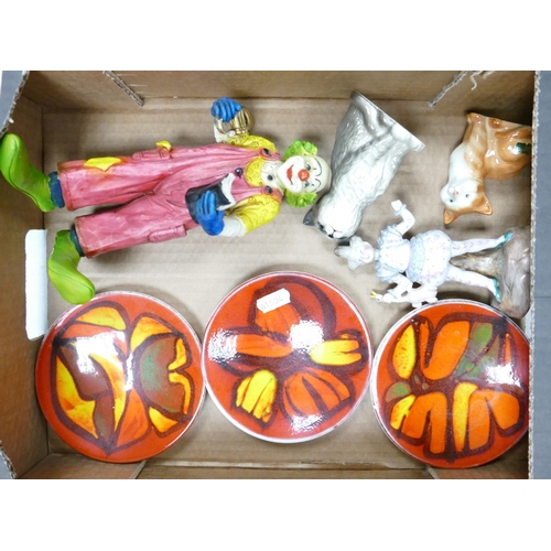 358 - A mixed collection of items to include three Poole pottery pin dishes, Goebel Happy Clown, Beswick g... 