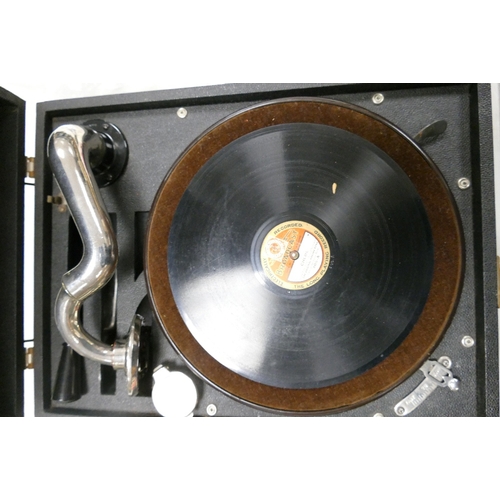 388 - Vintage Triumph portable cased record player with some records.