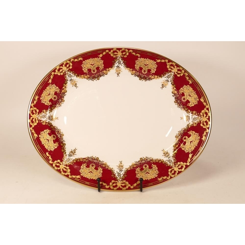 395 - De Lamerie Fine Bone China heavily gilded Christmas Garland patterned oval platter, specially made h... 