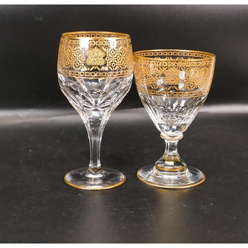 434 - Two De Lamerie Fine Bone China heavily gilded Non Matching Wine Glasses with Arabic Motif, specially... 