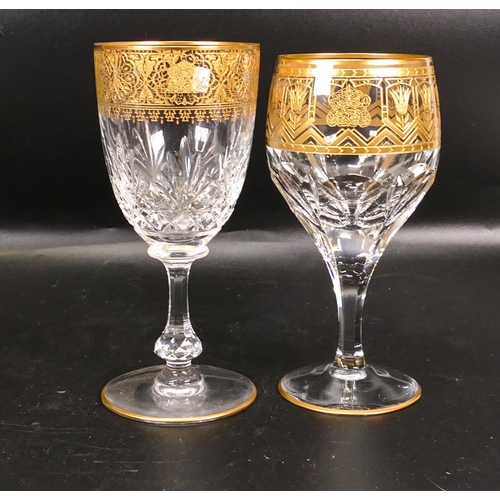 435 - Two De Lamerie Fine Bone China heavily gilded Non Matching Wine Glasses with Arabic Motif, specially... 