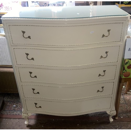 569 - Ivory Gilt chest of 5 drawers with floating glass top, 91cm wide.