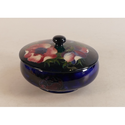 149 - Moorcroft Pink Anemone lidded pot . Diameter 14.5cm