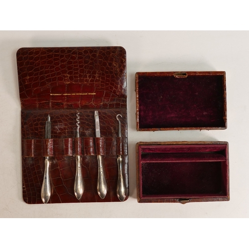 760 - Crocodile travelling jewellery case with hallmarked silver corners and unusual Crown insignia, indic... 