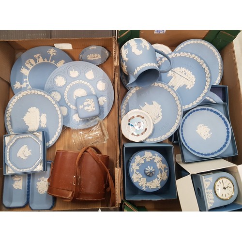 300A - A collection of Wedgwood jasperware items to include decorative wall plates, boxed mantle clock, jug... 