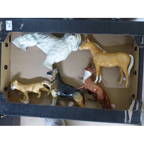 244 - A Collection of Ceramic Animals to include Beswick Palomino Horse, Beswick Fox Standing, Beswick Lio... 