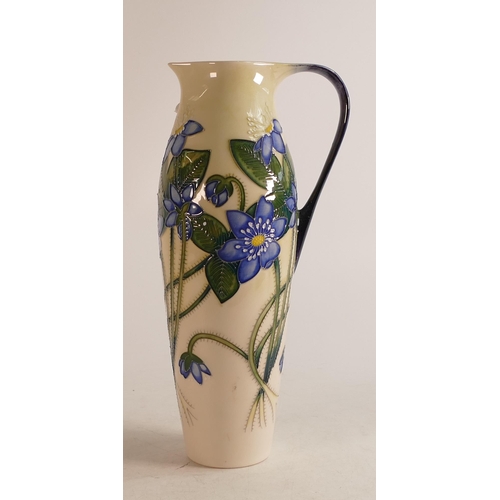 105 - Moorcroft trial blue floral jug on white ground with blue handle, dated 13/8/14, height 28cm