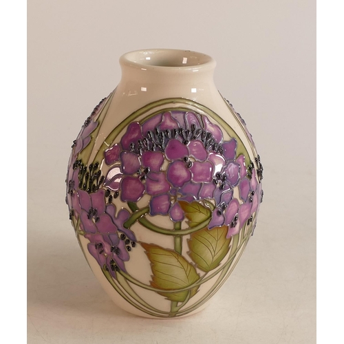 110 - Moorcroft trial vase with purple flowers on white ground, height 14cm