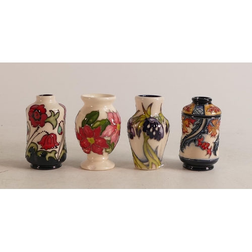 525 - Moorcroft miniature vases to include Poinsettia (chip to base), Poppies, Persephone and modern Aurel... 