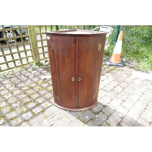 602 - George III Corner Cupboard. Two Hinges are Later Replacements. Height: 98cm