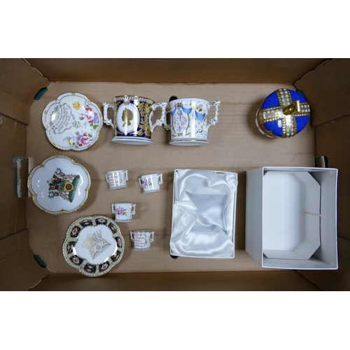 402 - A collection of Royal Crown Derby Royal Family Commemorative items to include pin dishes, loving cup... 