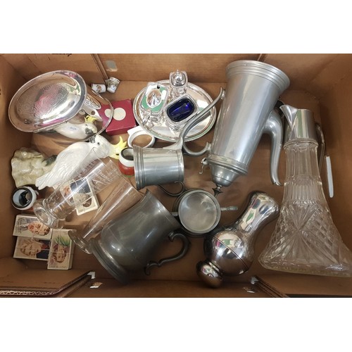 565 - A mixed collection of items to include a claret jug, pewter tea service items, silver plated cruet s... 