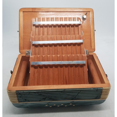 568 - Mid-Century Italian musical cigarette box in the form of an Accordian, 18cm x 14cm x 15cm.