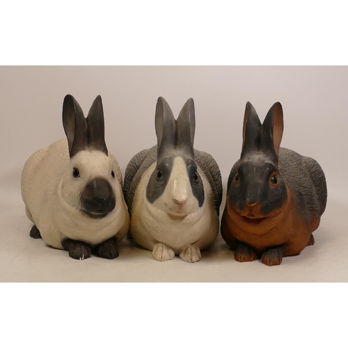 360 - Three North Light figures of rabbits in white/black x2 and brown/ black colourways, height 20cm (3)