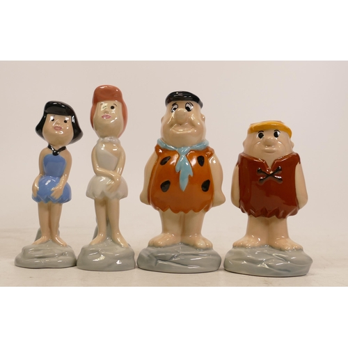 151 - Four Boxed Wade Flintstones Figurines to include Fred, Wilma, Betty, and Barney , with certificates ... 