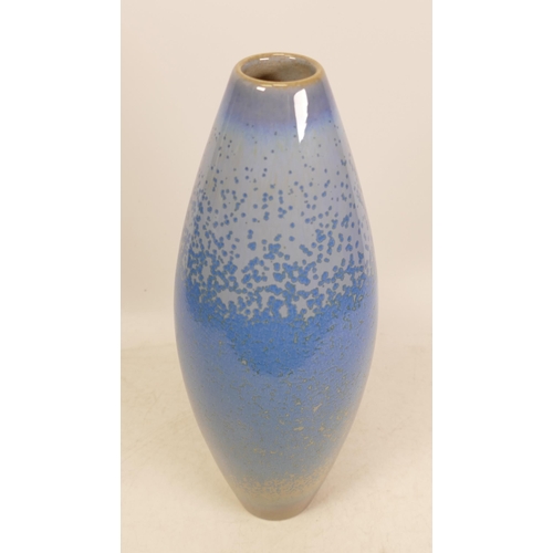 52 - Cobridge Stoneware vase on a mottle blue background. Height 31cm