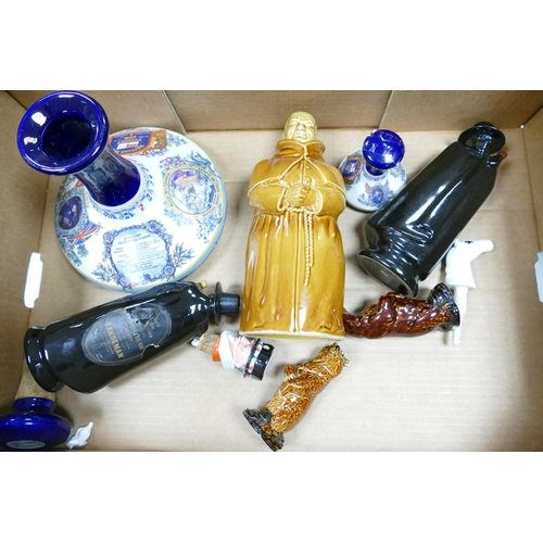 29 - A collection of Wade items to include commemorative decanters, Abbots Choice decanter, Armada Cream ... 