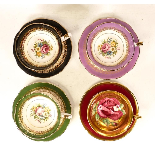 165 - Paragon Cabbage Rose Patterned Cup with non  matching saucer together with 3 similar Elizabethan Bra... 