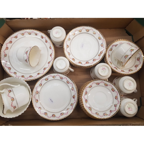 413 - Gladstone China 'Swag' patterned floral tea ware consisting of 7 cups, 12 saucers, 12 side plates, 2... 