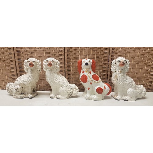 25 - A pair of ceramic Staffordshire dogs together with 2 other non matching Staffordshire dogs, height 3... 