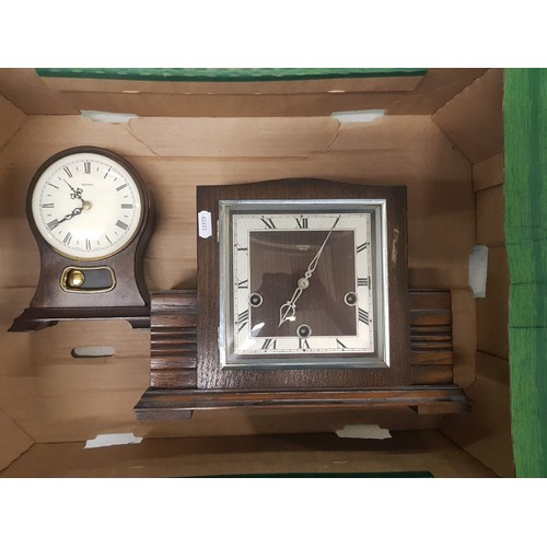 82 - Smiths late Art Deco period oak cased mantle clock together with a Metamec quartz clock.