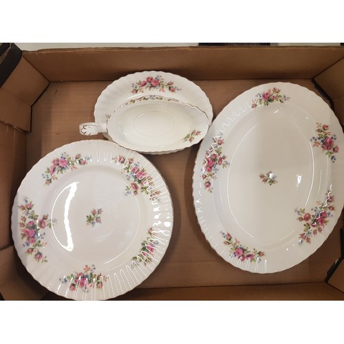 128 - Royal Albert Moss Rose pattern dinnerware items to include an oval platter, 6 dinner plates and a gr... 