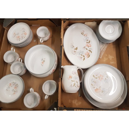 132 - An extensive collection of Denby 'Encore' pattern tea and dinner ware to include serving plates, cup... 
