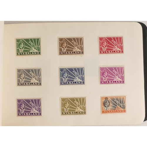 661 - Album of mainly Geo VI / QEII British Commonwealth mint stamps, all hinged. Approx 60 sets.