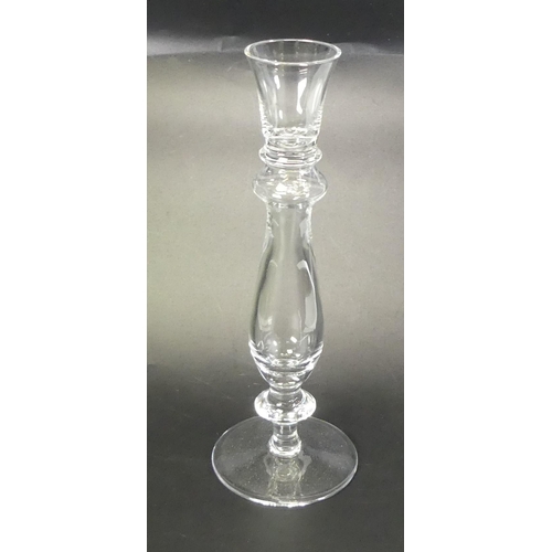 128 - Seven Ajka glass/crystal candlesticks , height 25cm. Boxed