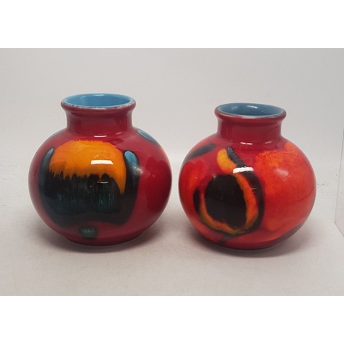 297 - Poole Pottery Volcano pattern vase together with a similar patterned vase height 10cm