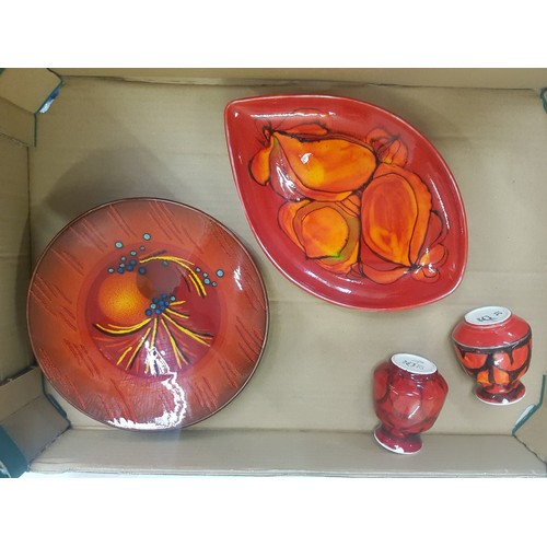 298 - Poole pottery teardrop shaped plate / charger together with two small Poole vases (1 with chip to ri... 